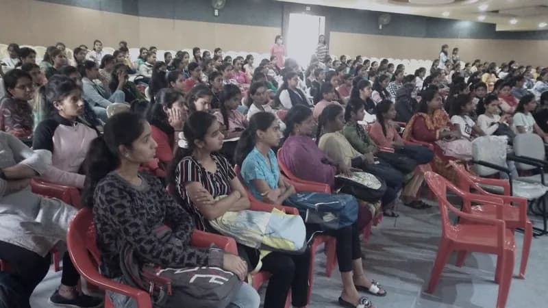 Women seated together at a FEW financial literacy session